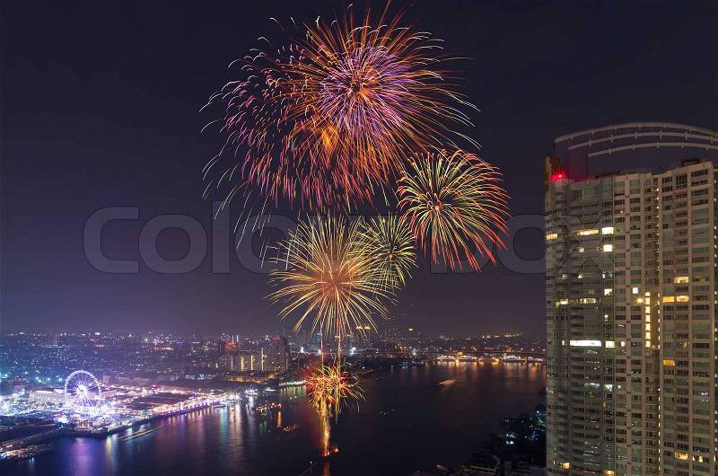 Happy New Year fireworks night scene, bangkok cityscape river view, stock photo