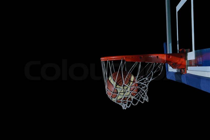Basketball ball, board and net on black background in gym indoor, stock photo