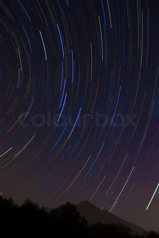 The Big Dipper star trail and the silhouette of Mount Tsukuba, stock photo
