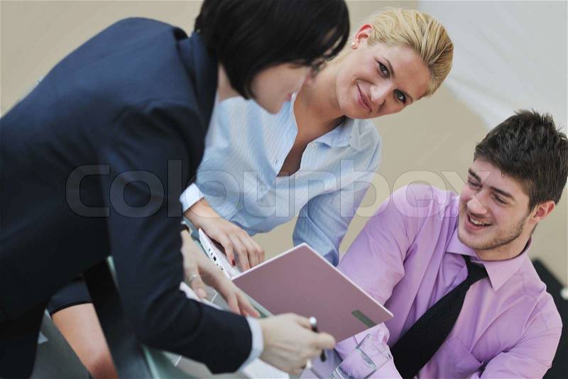 Happy young business people group have meeting at conference room and argue about new ideas and plans, stock photo