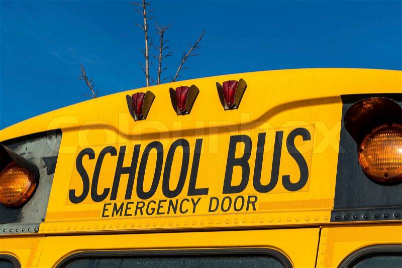 A typical american school bus in yellow color, stock photo