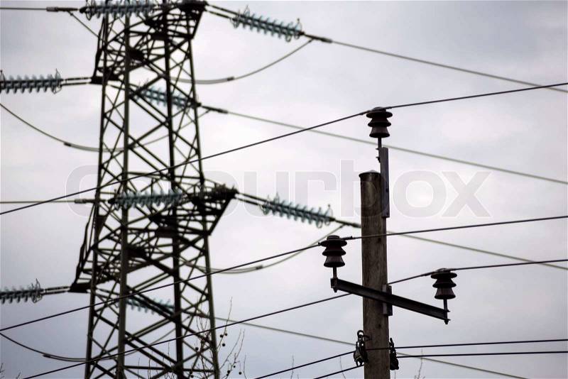 The current mast of a high voltage transmission line to carry electricity and energy, stock photo