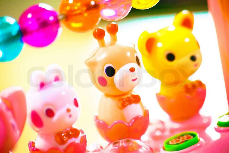 Close up of colorful children's toy animals lined up, stock photo