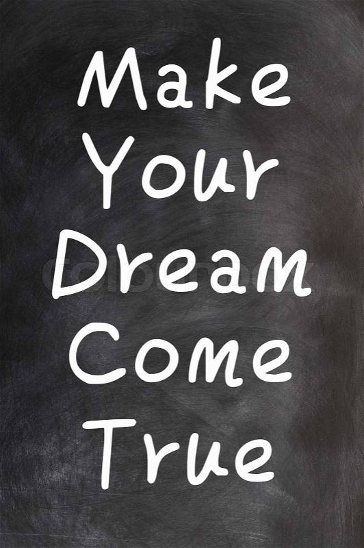 Make your dream come true - text written with chalk on a blackboard, stock photo