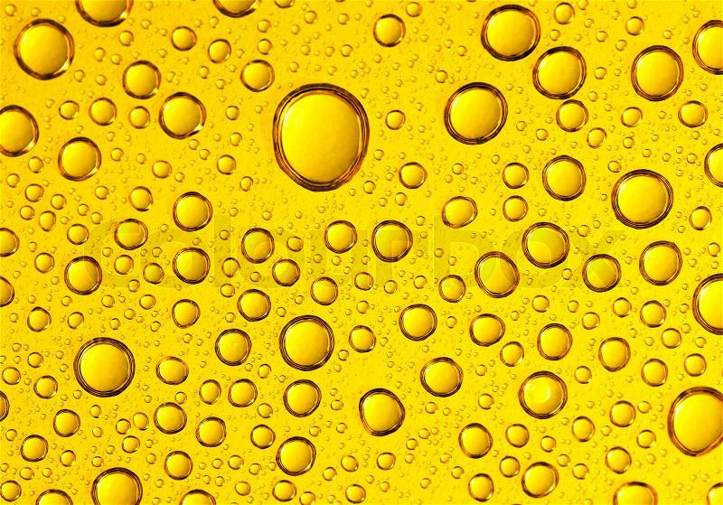 Water drops on beer background , stock photo