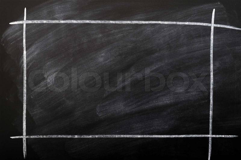 Smudged chalkboard background with a chalk drawing frame, stock photo