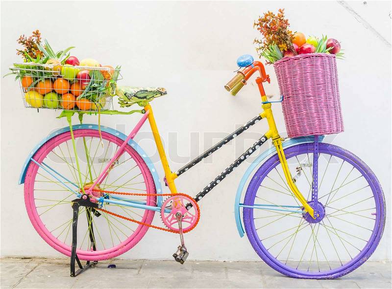 Bicycle with basket fruit and flower, stock photo