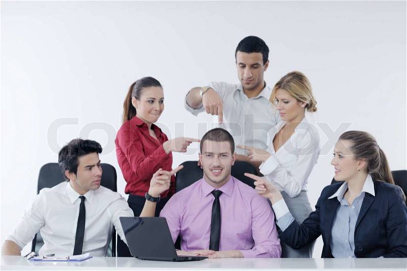 Business people team at a meeting in a light and modern office environment, stock photo