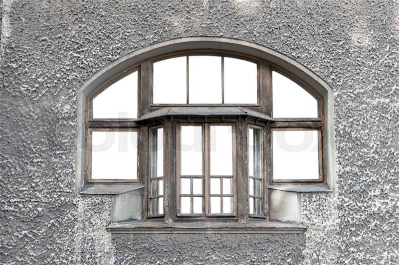 Old window at the gray wall, stock photo