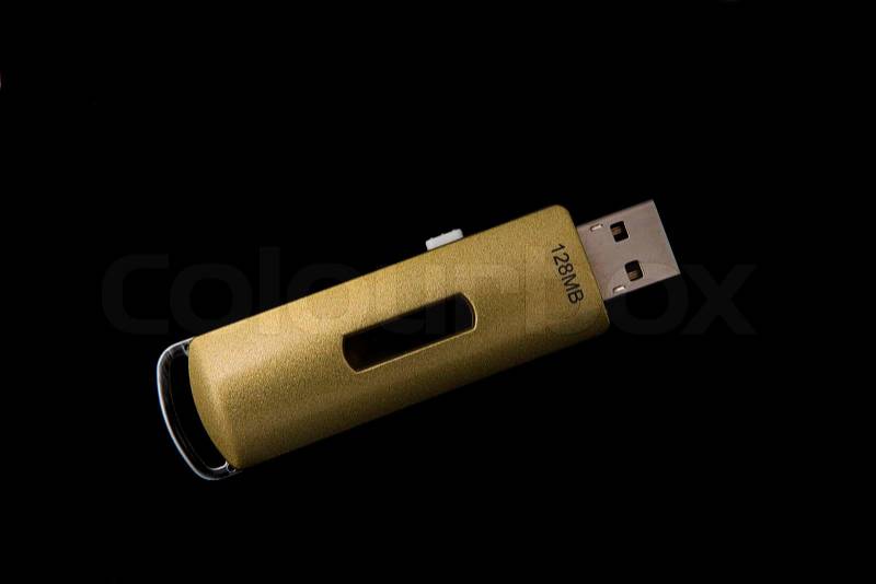 Close up view of usb flash drive on black back, stock photo