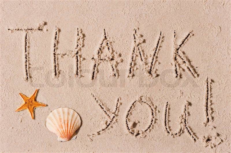 Word of thank you to the wet sand or seashells, stock photo