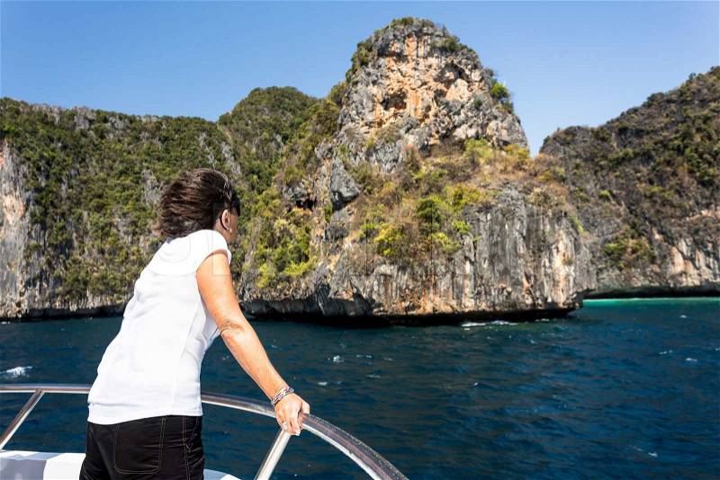 Traveller woman in boat trip on summer vacation boat island of Phuket,Thailand, stock photo