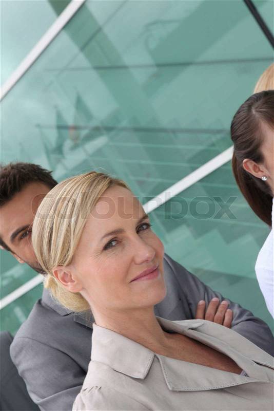 Headshot smart happy workers outside office building, stock photo