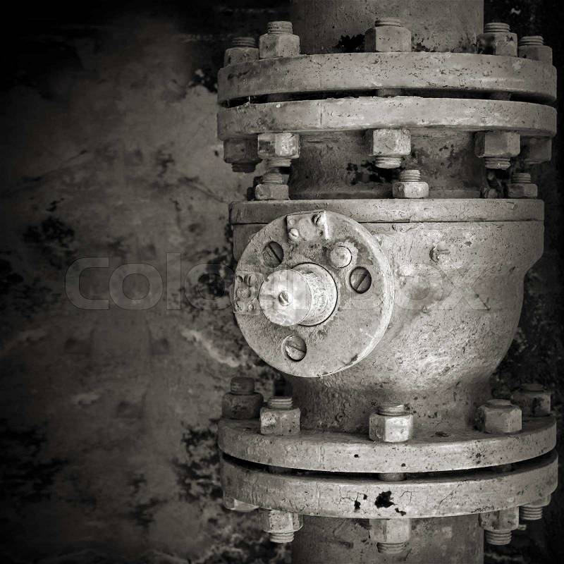 Old rusted industrial valve. Monochrome closeup photo, stock photo