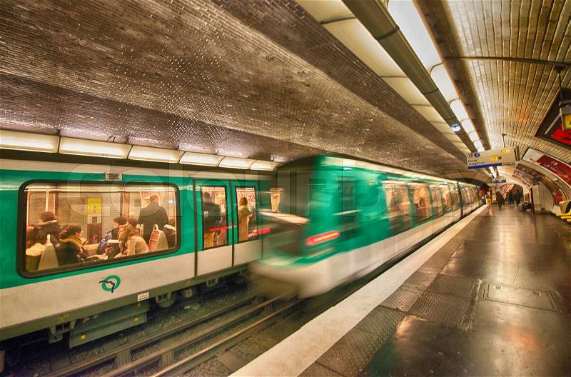 PARIS, DEC 4: Underground train inside a metro station, December 4, 2012 in Paris. Paris Metro is the 2nd largest underground system worldwide by number of stations (300), stock photo