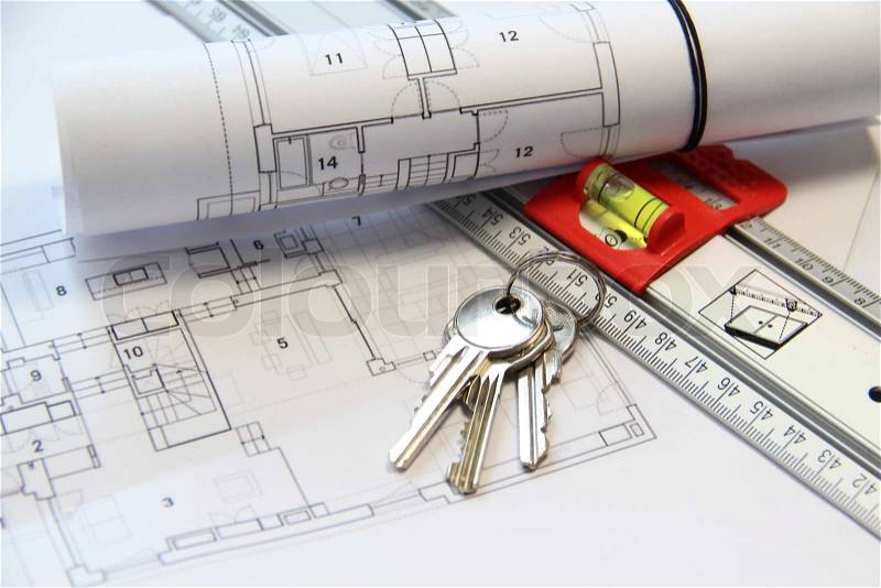 Architecture project on the office table with tools and keys , stock photo