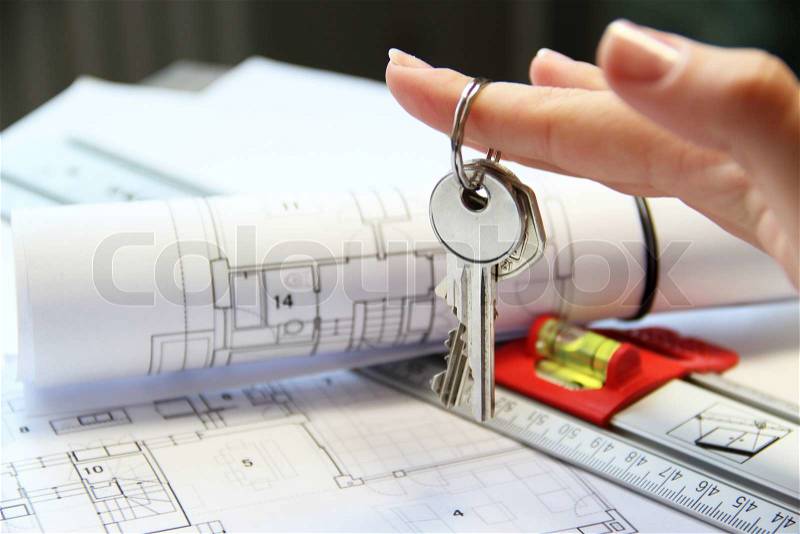 Architecture project on the office table with tools and keys, stock photo