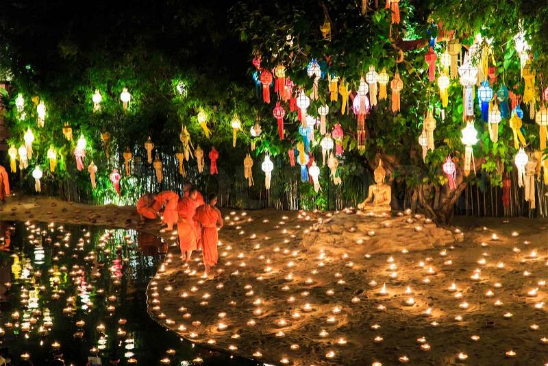 CHIANG MAI THAILAND-NOVEMBER 17 : Loy Krathong festival in Chiangmai.Tradition al monk Lights floating balloon made of paper annually at Wat Phan Tao temple.on November 17,2013 in Chiangmai,Thailand, stock photo