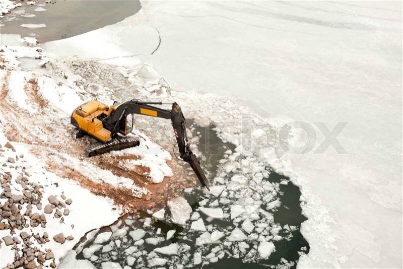 Machine breaking the ice, stock photo