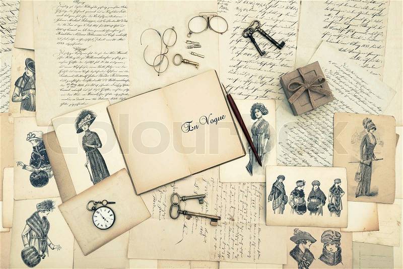 Antique accessories, old letters and fashion drawings from 1911. vintage nostalgic background, stock photo