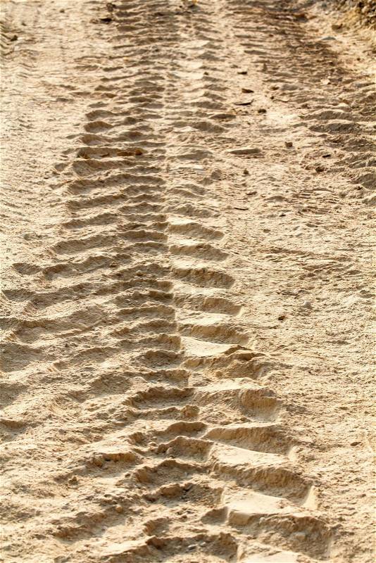 Tractor tire tracks on dirt, stock photo