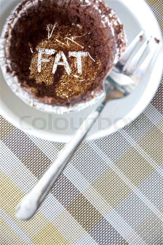 Fat words on sweet empty cup, stock photo