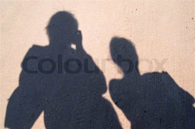 Shadows on a sandy road, stock photo