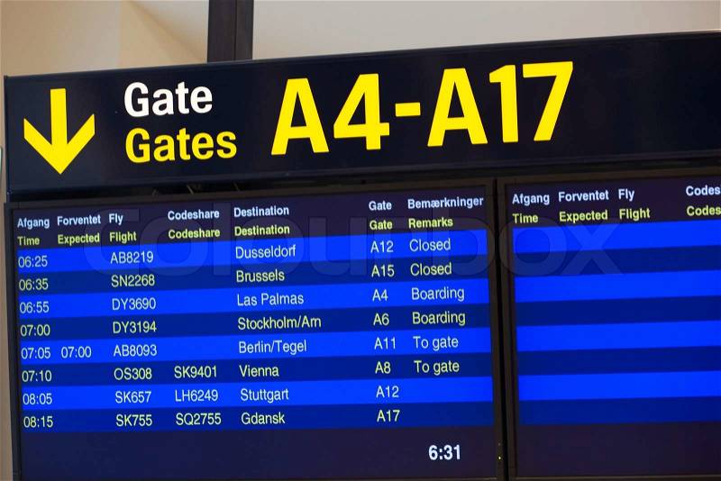 Departure information at the Kastrup Airport in Copenhagen, Denmark, stock photo