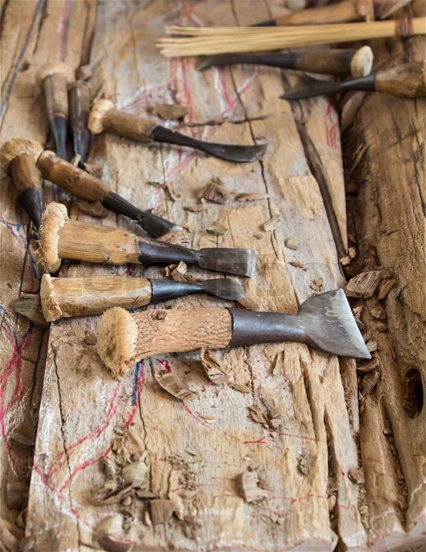 Old wood chisels with shavings on work, stock photo