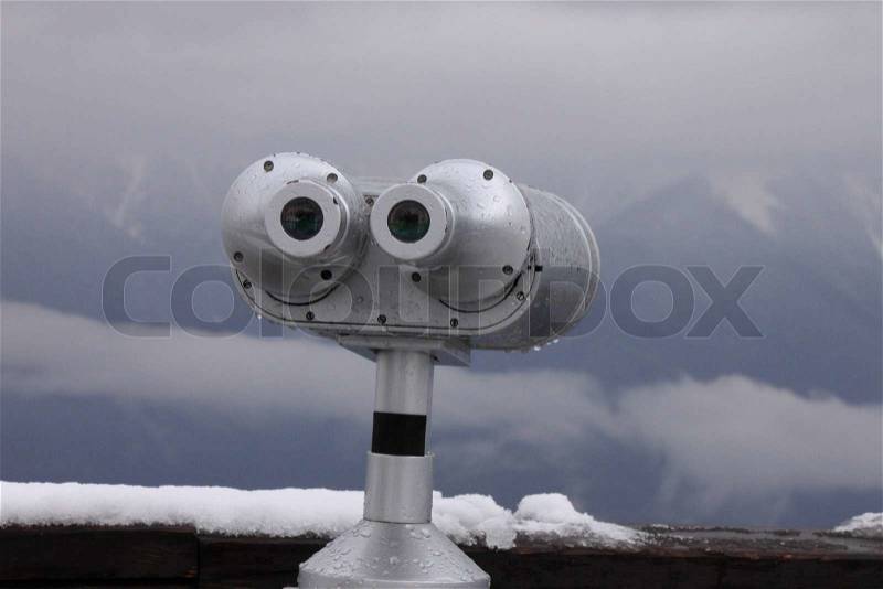 Observation point in mountains at snowing weather, stock photo