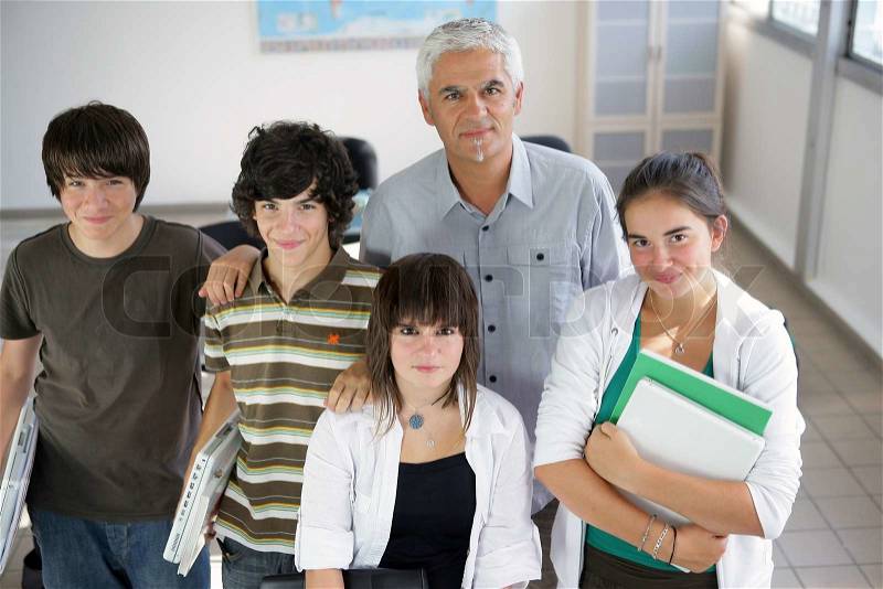 A group of pupils with their teacher, stock photo