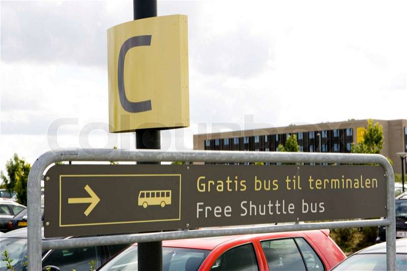 Sign for \'free shuttle bus\' in Billund airport, stock photo