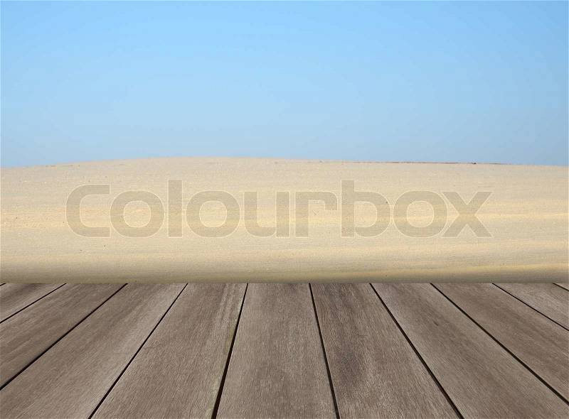 Wood floor with blue sky white sand beach background, stock photo