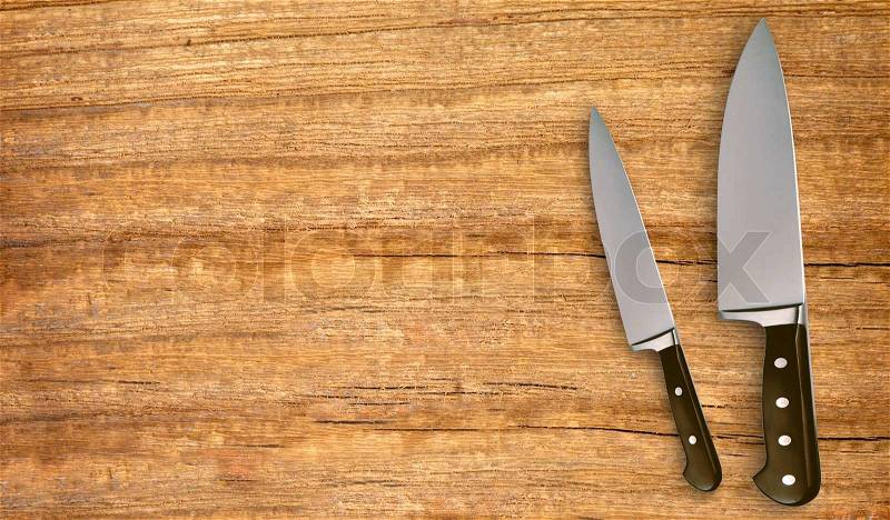 Knife on cutting board isolated on white background, stock photo