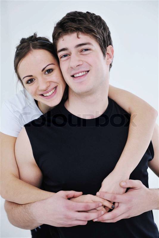 Happy young couple fitness workout and fun at sport gym club, stock photo