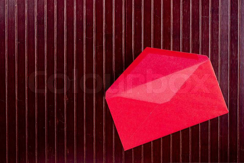 Background with sheet of paper and pen red envelope, stock photo