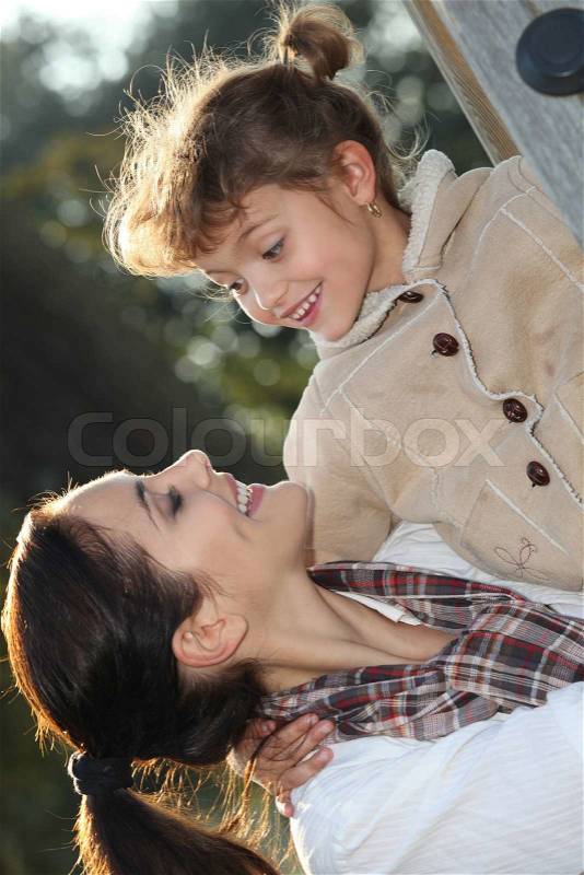 Mother and daughter at the park, stock photo