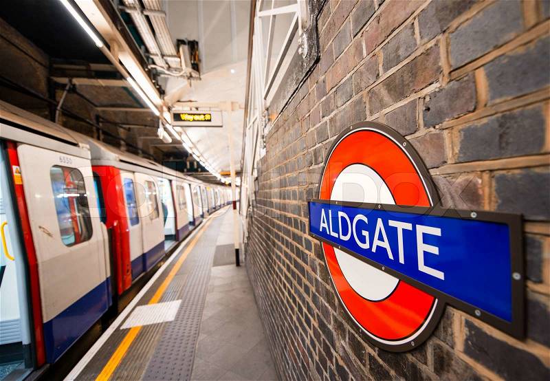 LONDON - AUG 22, 2013: Inside view of London Aldgate station and train. London\'s system is the oldest underground railway in the world, dating back to 1863, stock photo