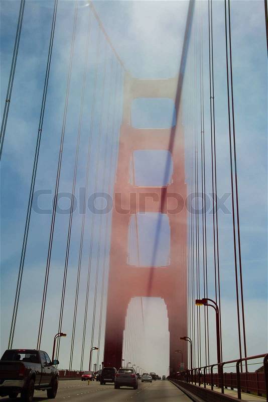 Traffic on the suspension bridge, Golden Gate Bridge, San Francisco Bay, San Francisco, California, USA, stock photo