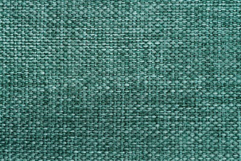 Closeup detail of green fabric texture background, stock photo