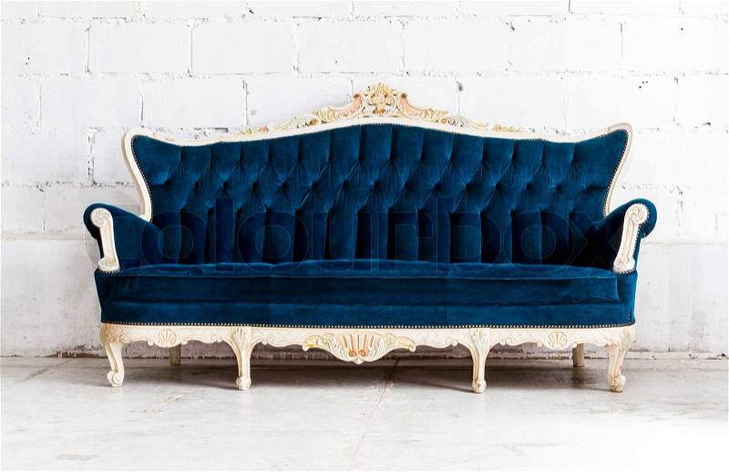 Blue classical style sofa couch in vintage room, stock photo