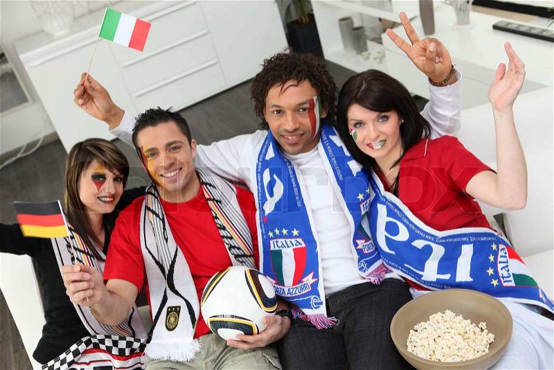 Italian and German soccer fans, stock photo