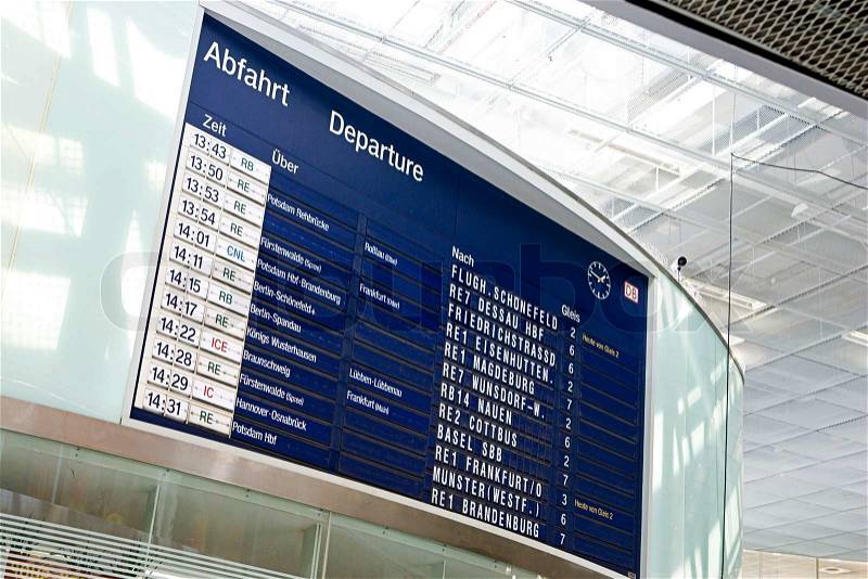 Departure schedule board in a german train station, stock photo