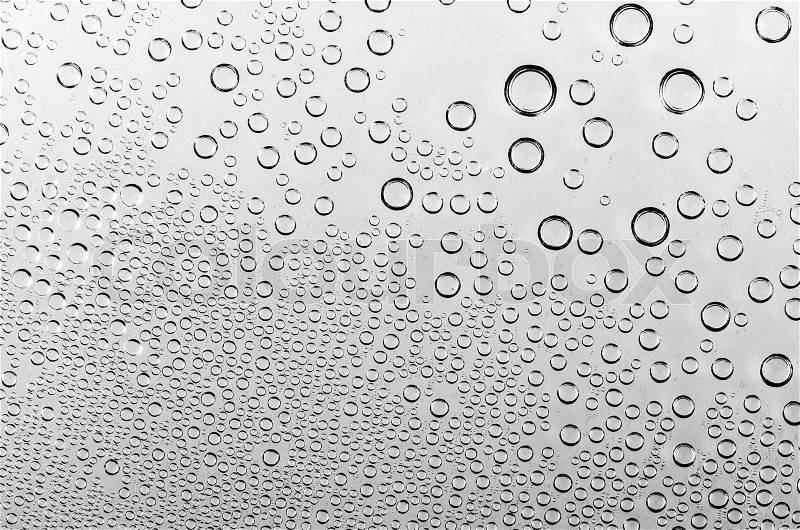 Water drop on black and white background (Process dark black and white style pictures), stock photo