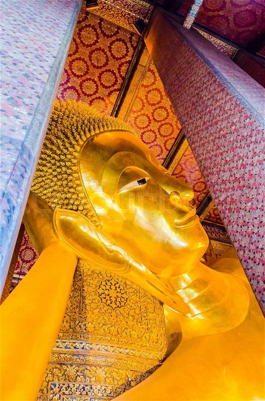 Reclining Buddha in wat pho bangkok thailand, stock photo