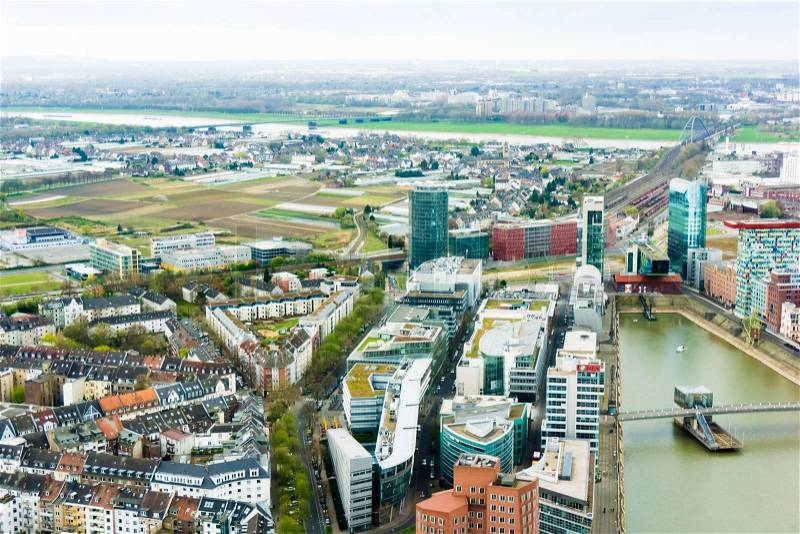 Wide angle picture of river Rhine, Duesseldorf. Seen from the television tower Rheinturm, Germany . Duesseldorf mediahafen (harbour) in Rheinland-Westphalia, stock photo