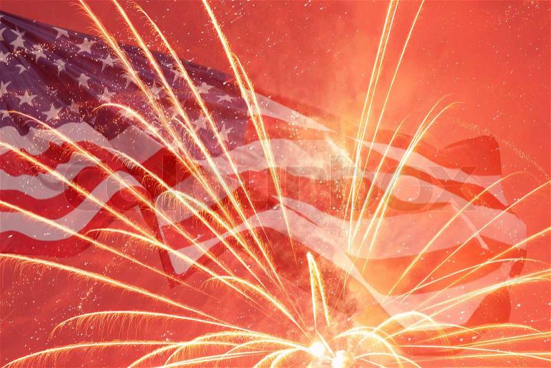 Independence Day fireworks over United States flag, stock photo