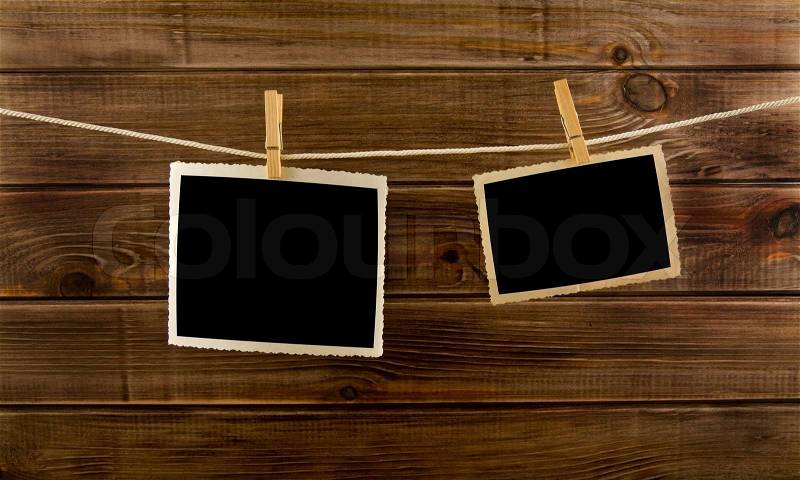 Pictures on a wooden background , stock photo