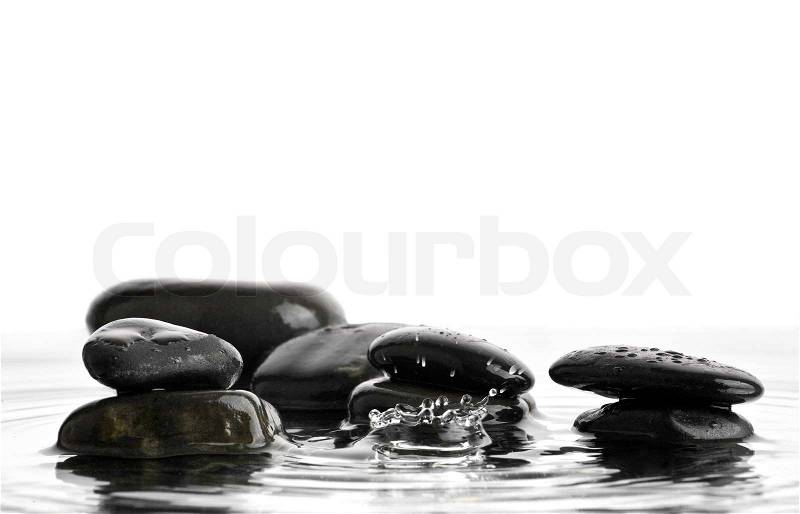 Stone in water with drops on a white background, stock photo
