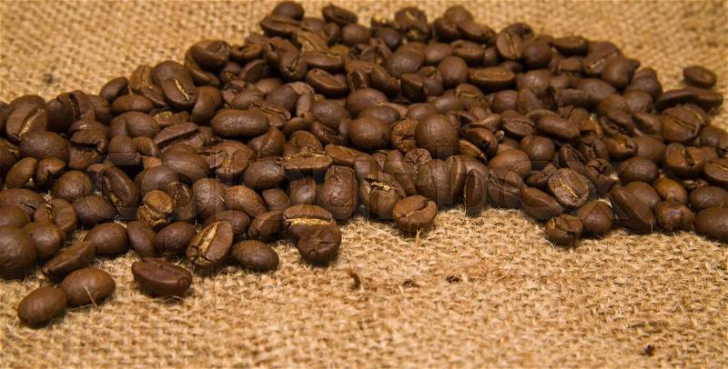 Grains of coffee on a background a rough matter, stock photo